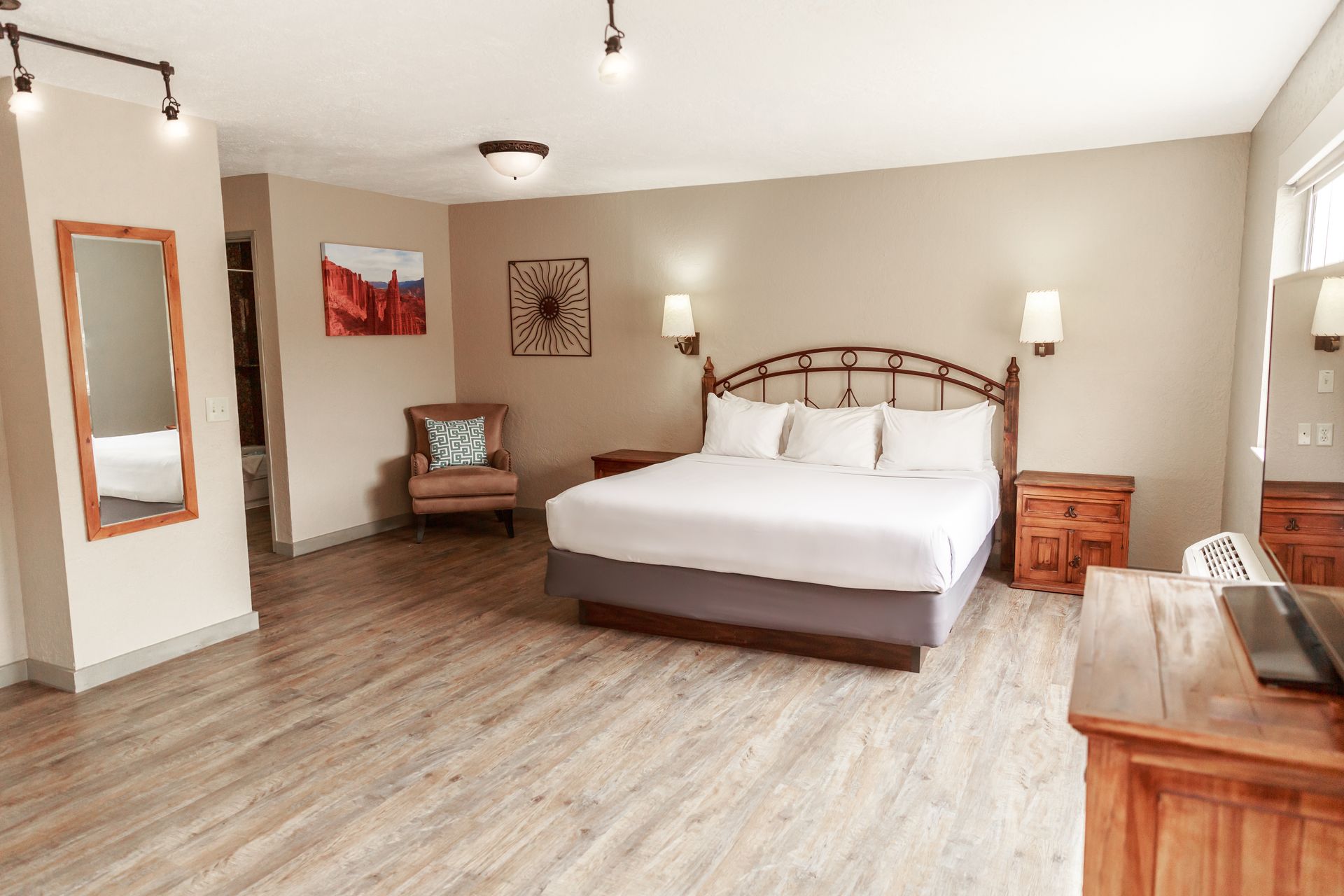 There is a large bed in the middle of the room.