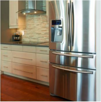 Stainless steel refrigerator freezer in a beautiful kitchen in Waco Tx