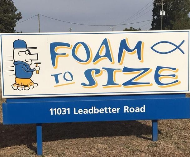 A sign that says foam to size on it