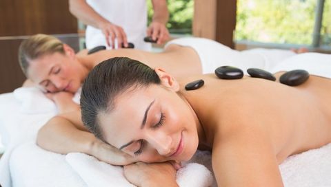 Two Ladies Having Stone Massage — Chandler, AZ — TLC Massage & Co