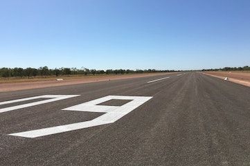 A runway with the number 79 painted on it.