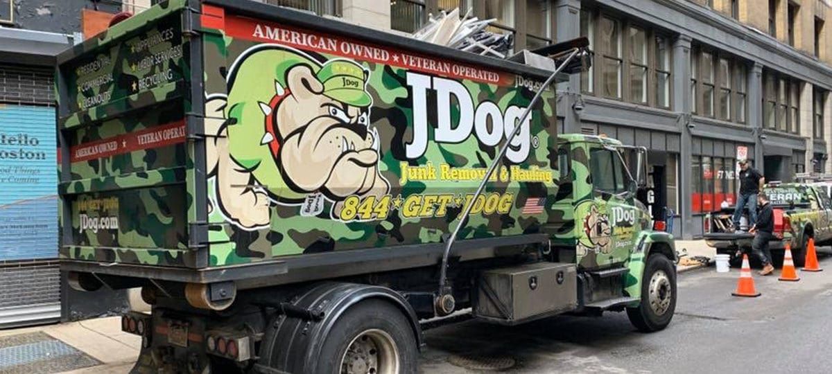 A camouflage dump truck with 