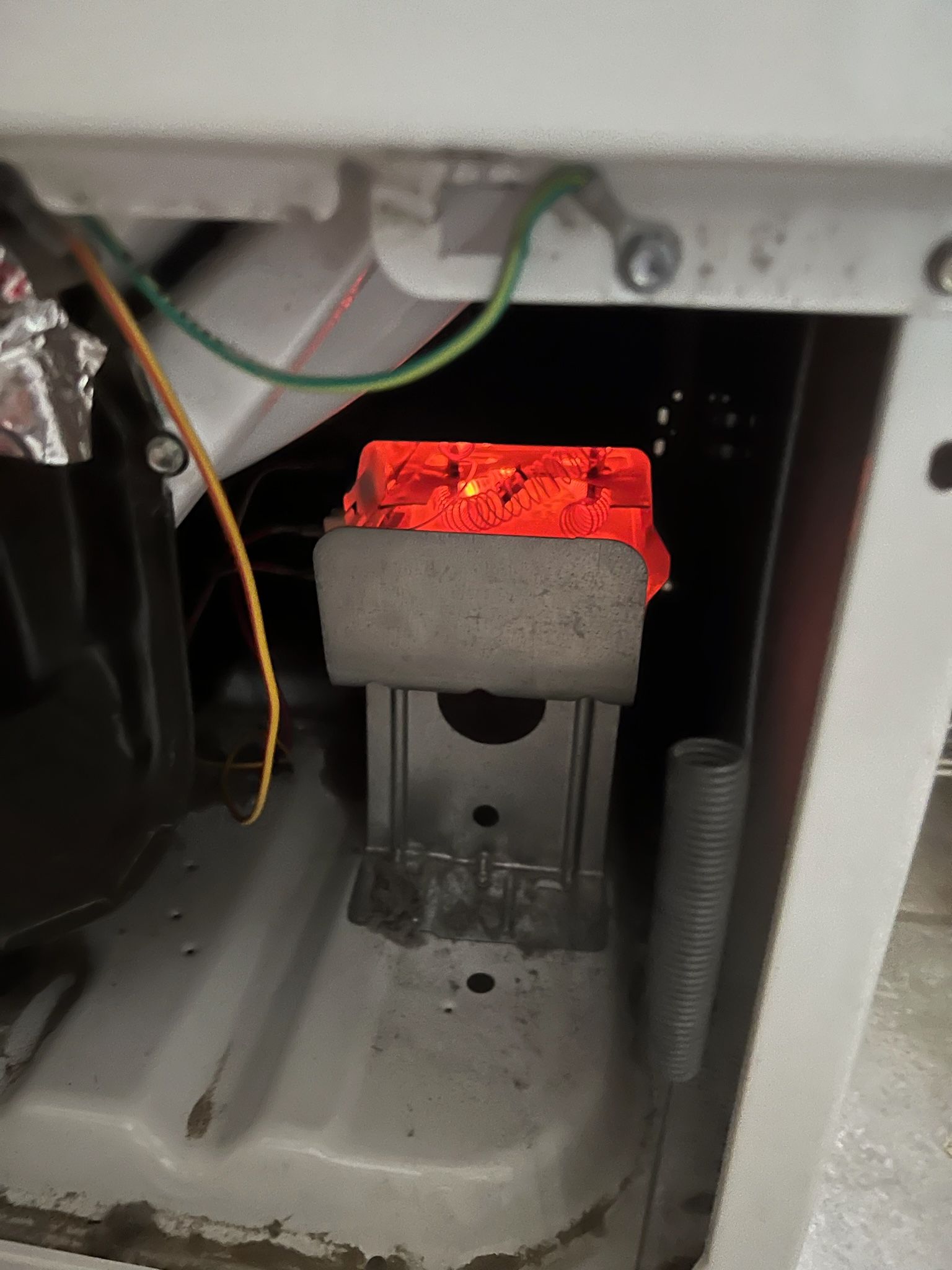 Dryer heating elements need to glow a certain brightness. This one indicates overheating likely due to a clogged vent!