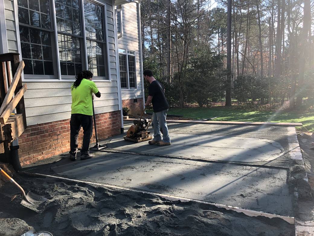 Applying Cement Sand on Concrete Floor