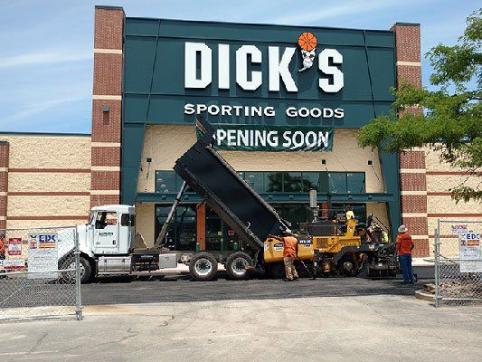 10 Wheeler Truck in Front of Commercial Building — Bloomington, IL — McLean County Asphalt Co.