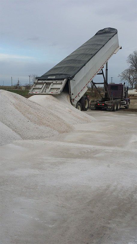 Commercial Vehicle Dropping Salt on a Road — Bloomington, IL — McLean County Asphalt Co.