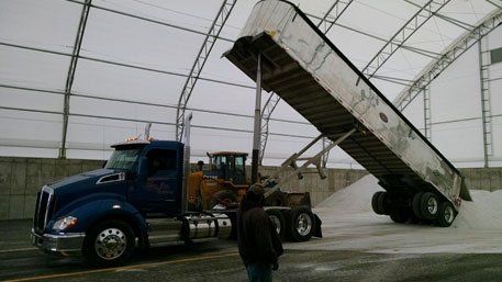 Adding Salt on a Stadium — Bloomington, IL — McLean County Asphalt Co.