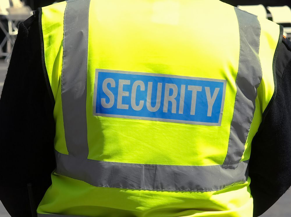 A Security Guard in a Yellow Reflective Vest — Clinton Security Services In Warwick, QLD