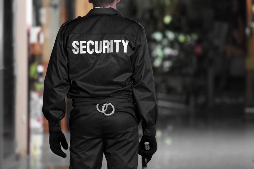 A Security Guard in Black Uniform — Clinton Security Services In Goondiwindi, QLD
