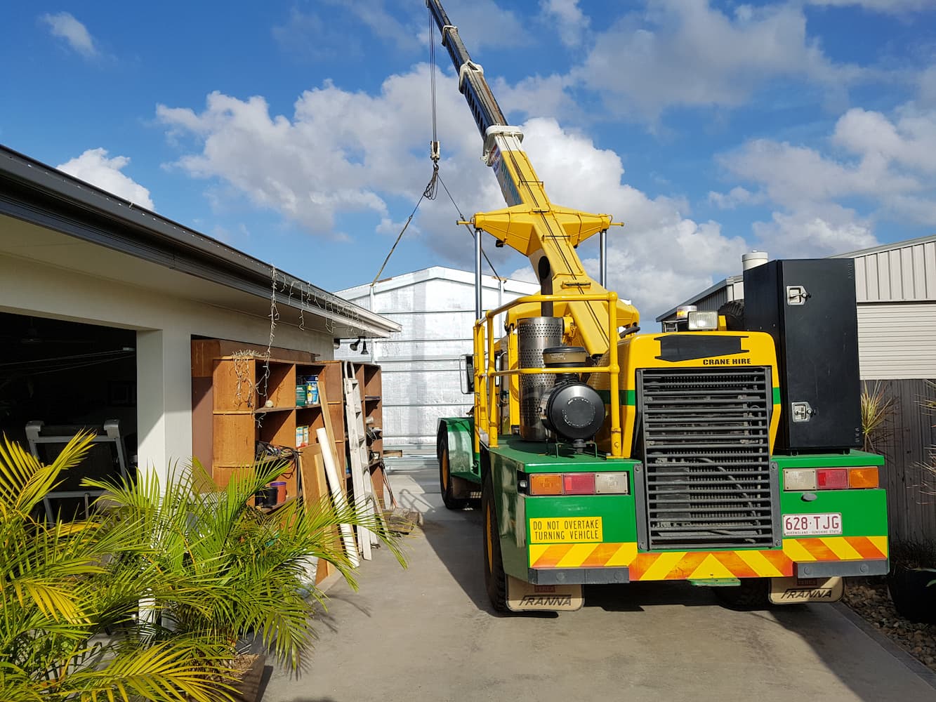 Crane Transporting Residential Shed — State Wide Lift & Shift in Paget, QLD