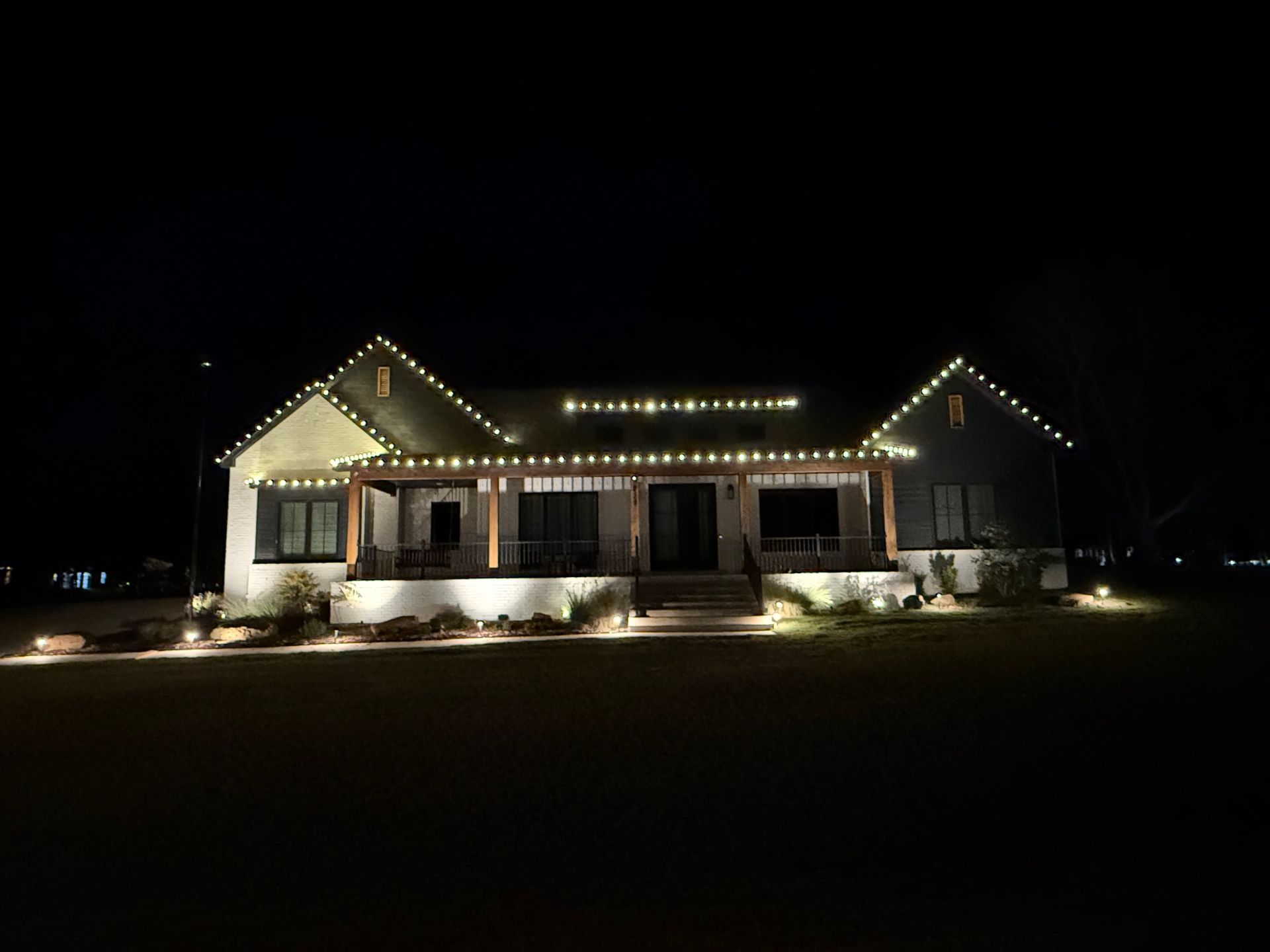 Concrete sidewalk under construction, wooden forms in place.