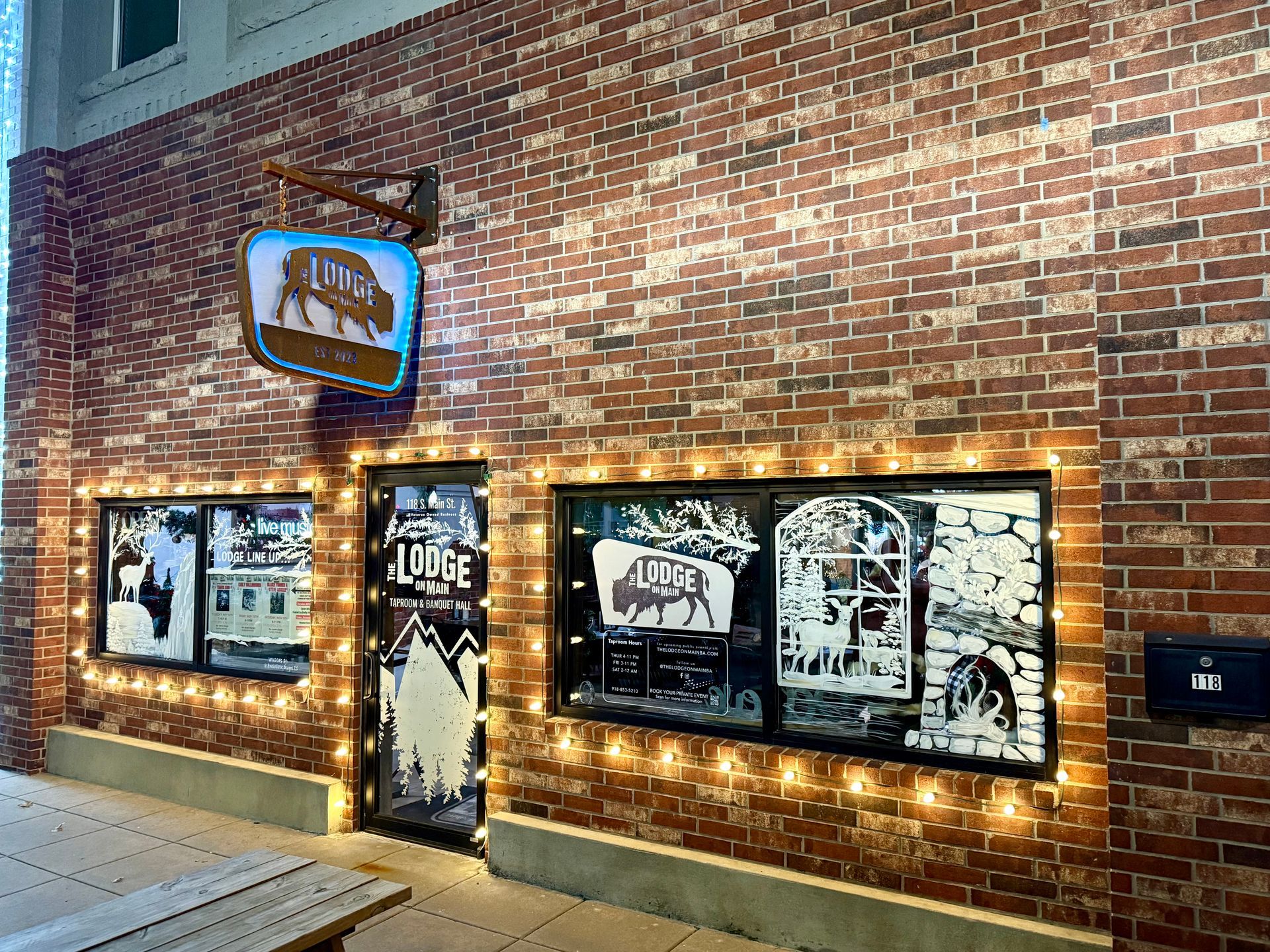 Concrete steps leading down, surrounded by brown mulch.
