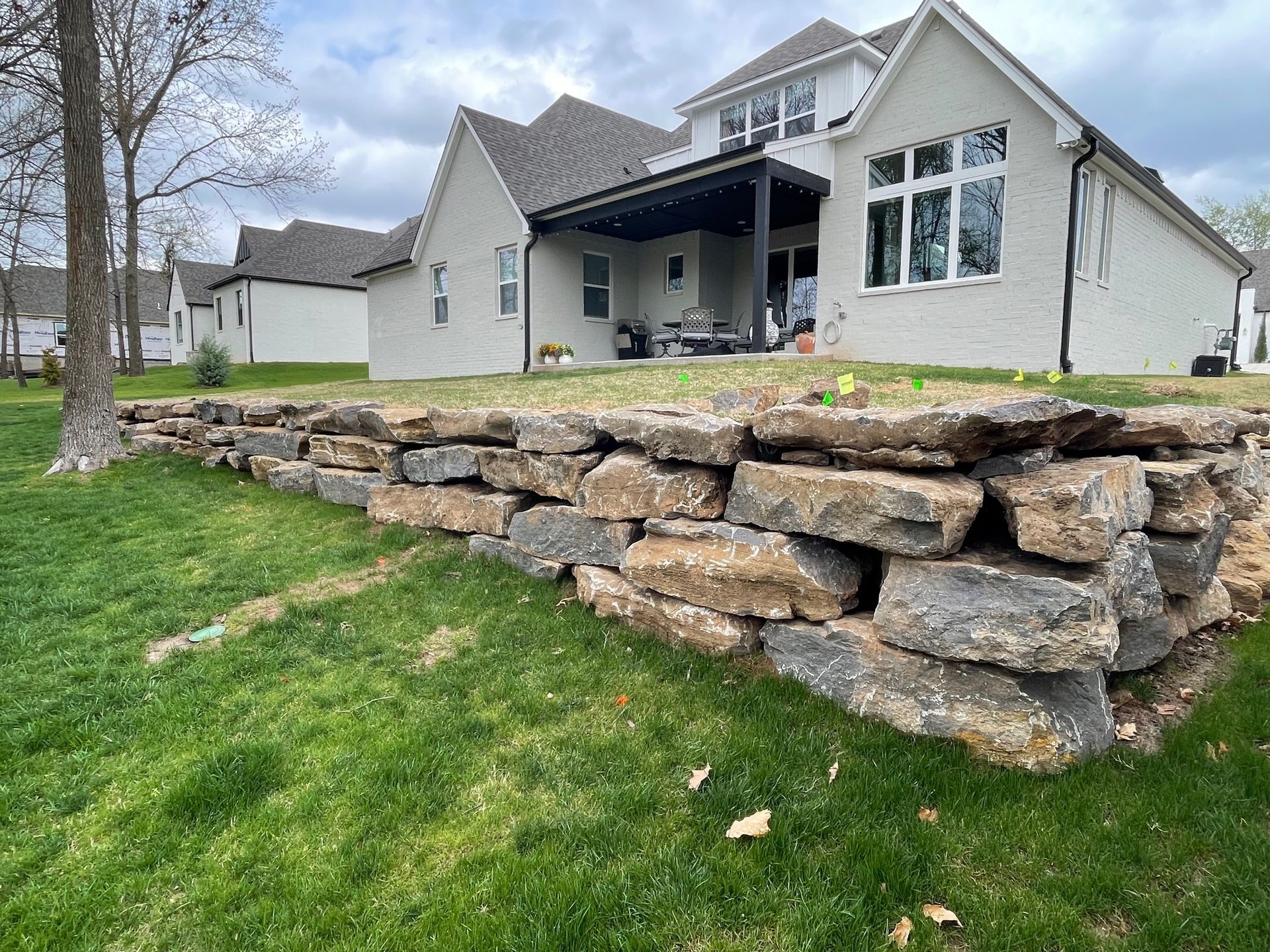 Concrete sidewalk under construction, wooden forms in place.