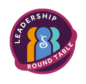 Logo with three stylized figures in orange, blue, and teal, with a white 'S' icon inside a purple circle and text.