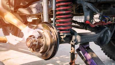 Auto Maintenance — Mechanic Inspecting A Car Break in Morton, PA