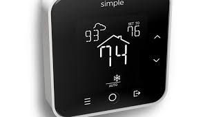 A blue boiler and water heater in a basement with copper pipes.