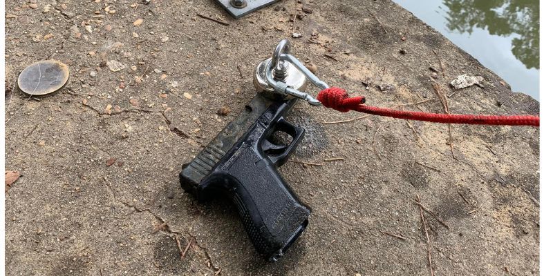 gun found magnet fishing