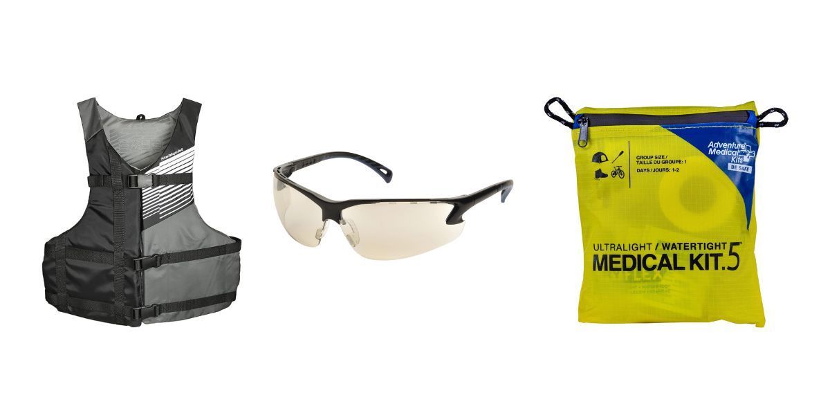 A life vest a pair of sunglasses and a medical kit