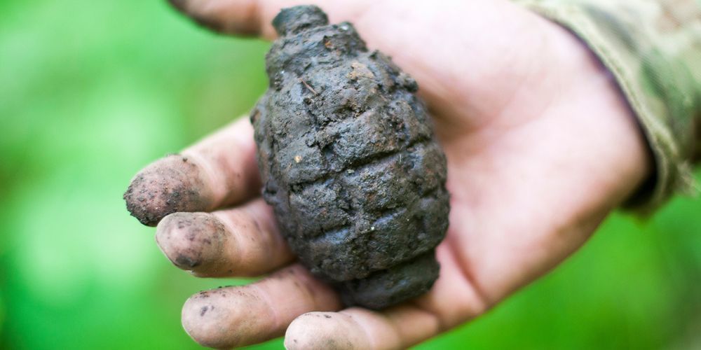 A grenade in someone's hand