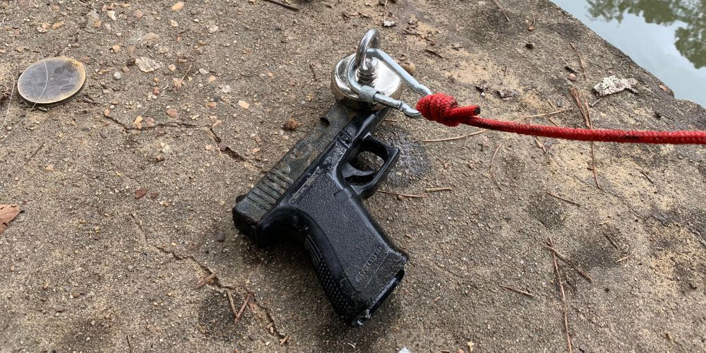 a gun attached to a magnet