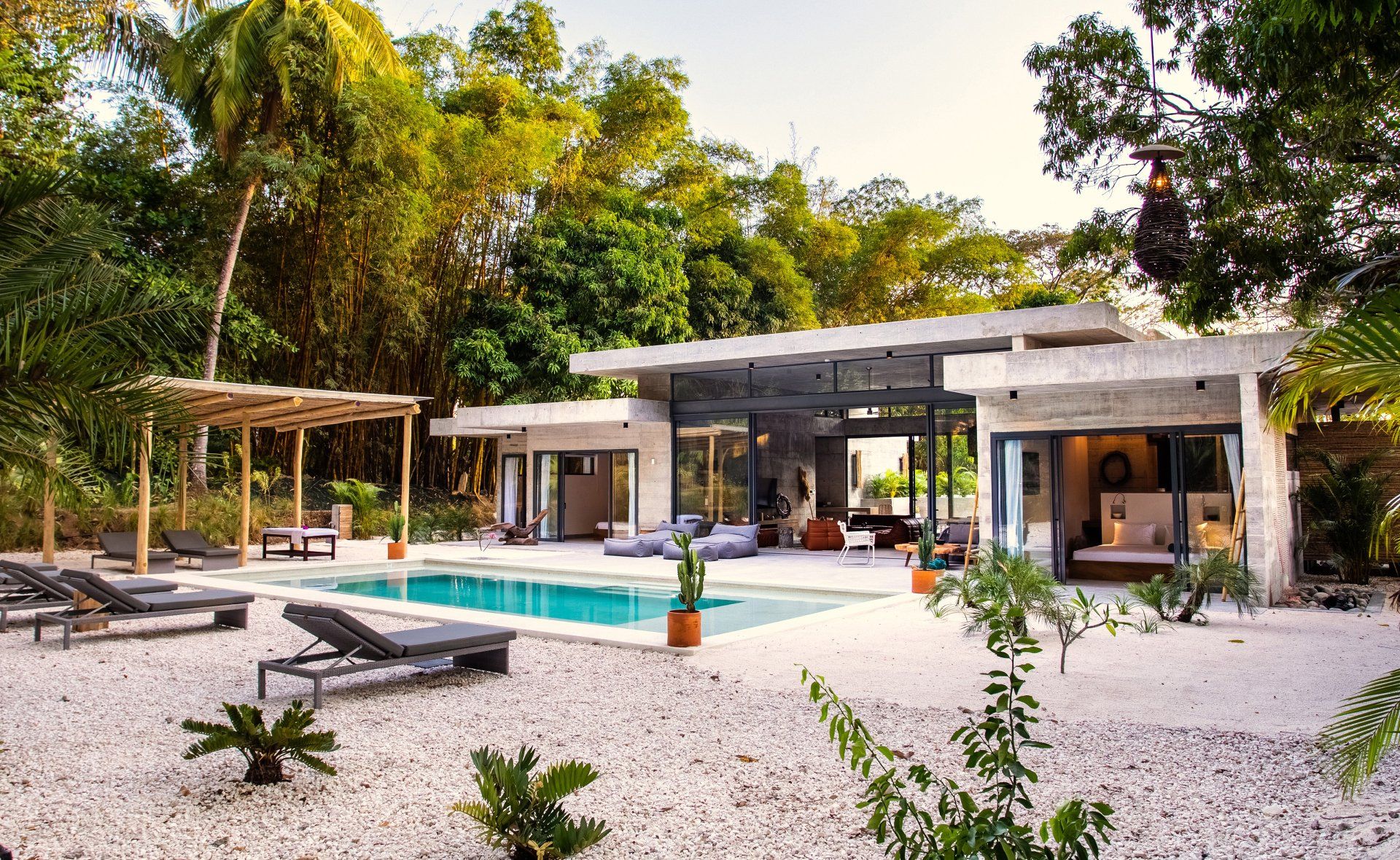 A large house with a swimming pool in the backyard