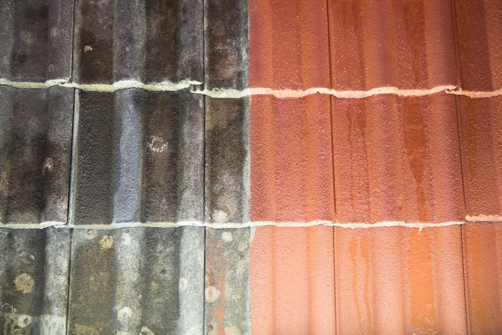 A Close Up Of A Black And Red Roof — Glenroofing Pty Ltd In Taree, NSW