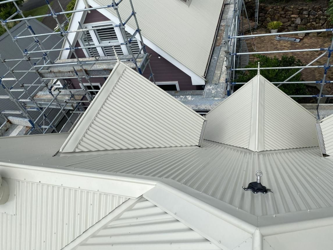 An Aerial View Of The Roof Of A Building With Scaffolding Around It — Glenroofing Pty Ltd In Taree, NSW
