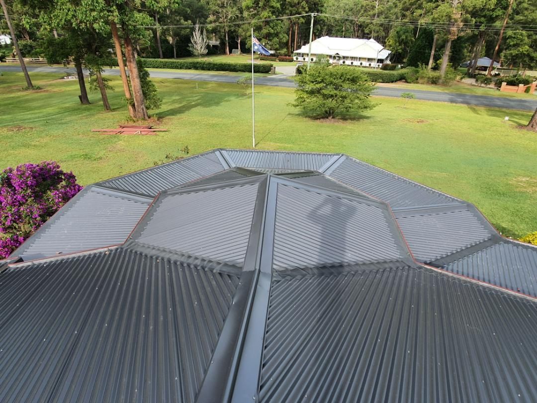 An Aerial View Of A Roof With Trees In The Background — Glenroofing Pty Ltd In Port Macquarie, NSW