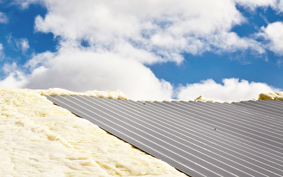 A Room With A Roof Window And Foam Insulation On The Ceiling — Glenroofing Pty Ltd In Taree, NSW