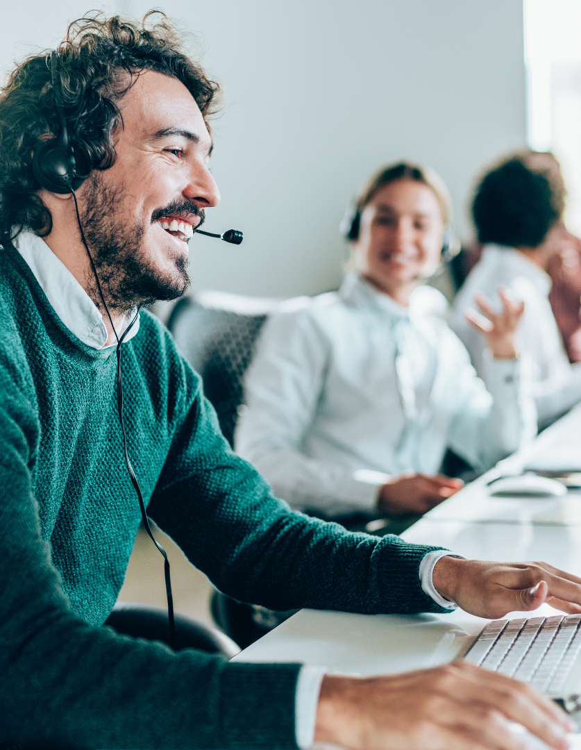 A robot is using a virtual screen in a room.