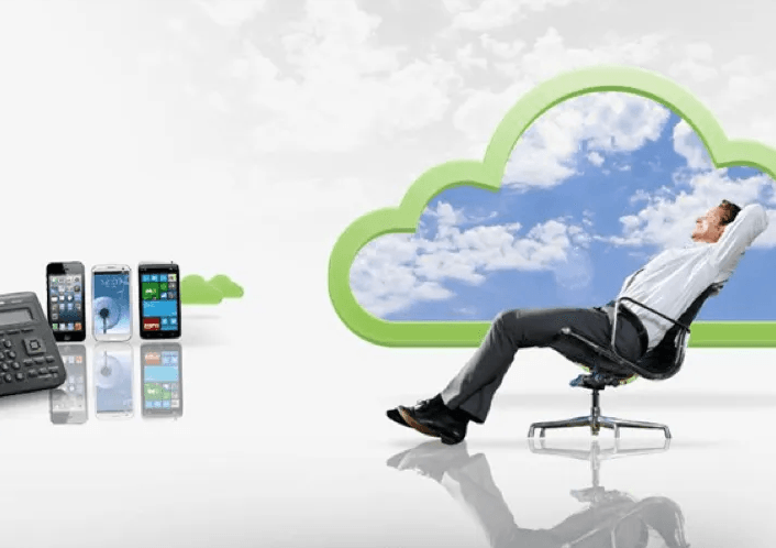 A man is sitting in a chair in front of a cloud
