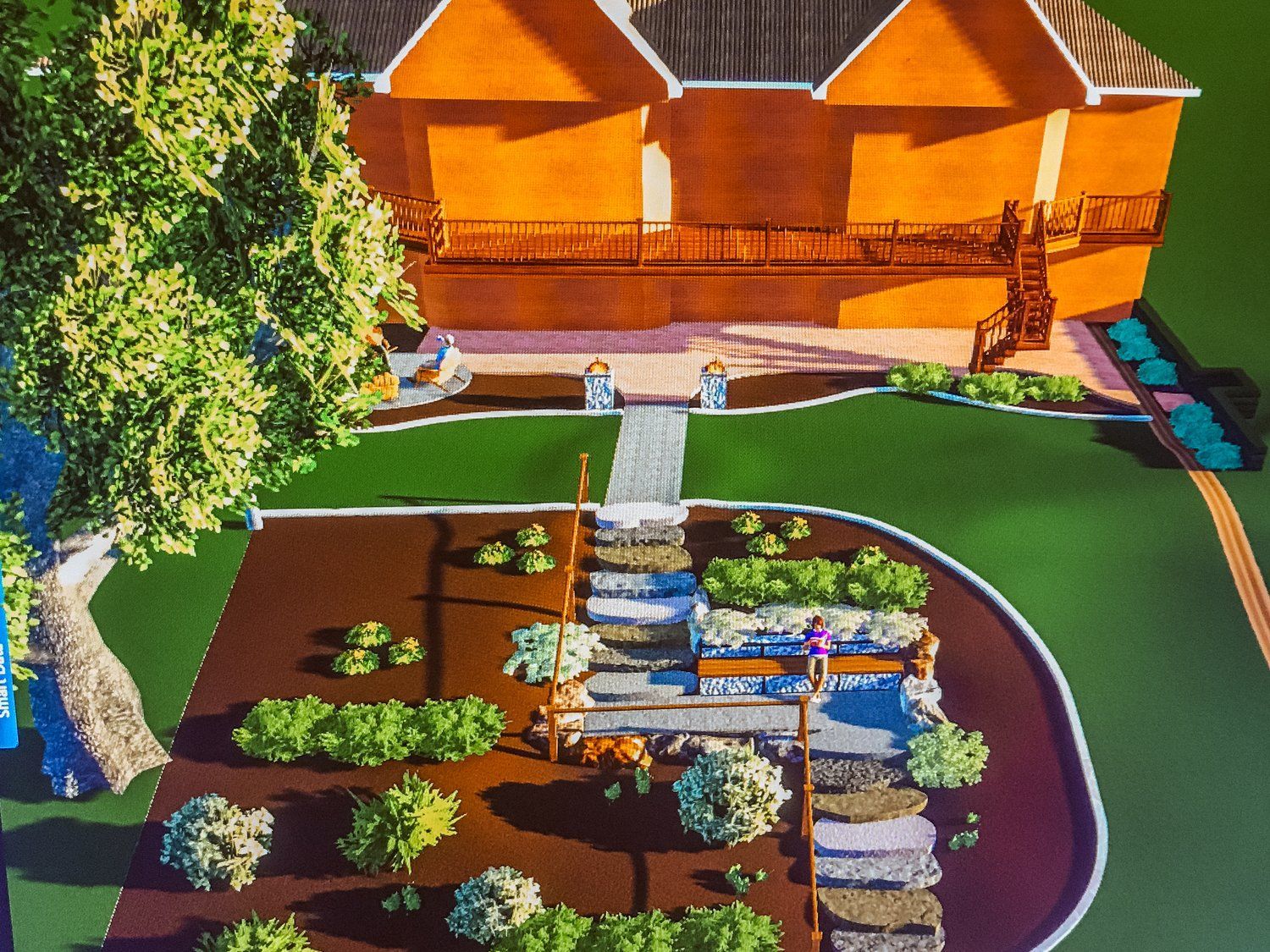 An aerial view of a house surrounded by trees and bushes