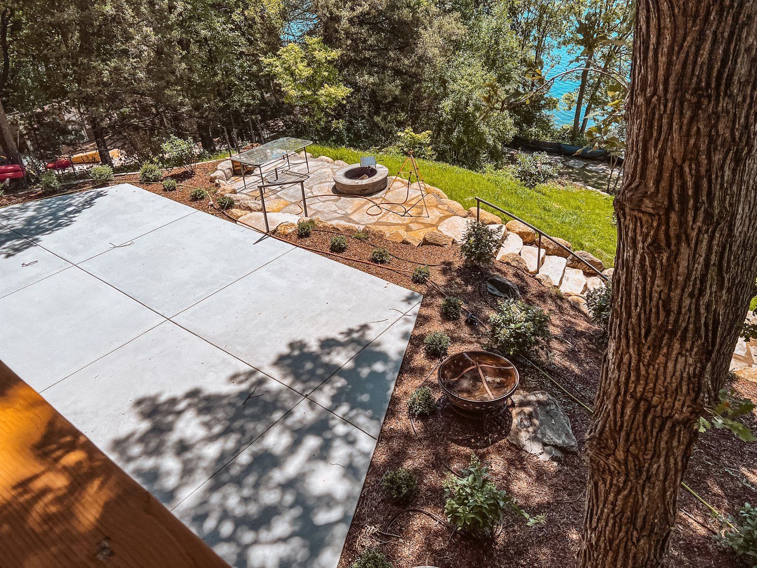 There is a fire pit in the middle of the yard.