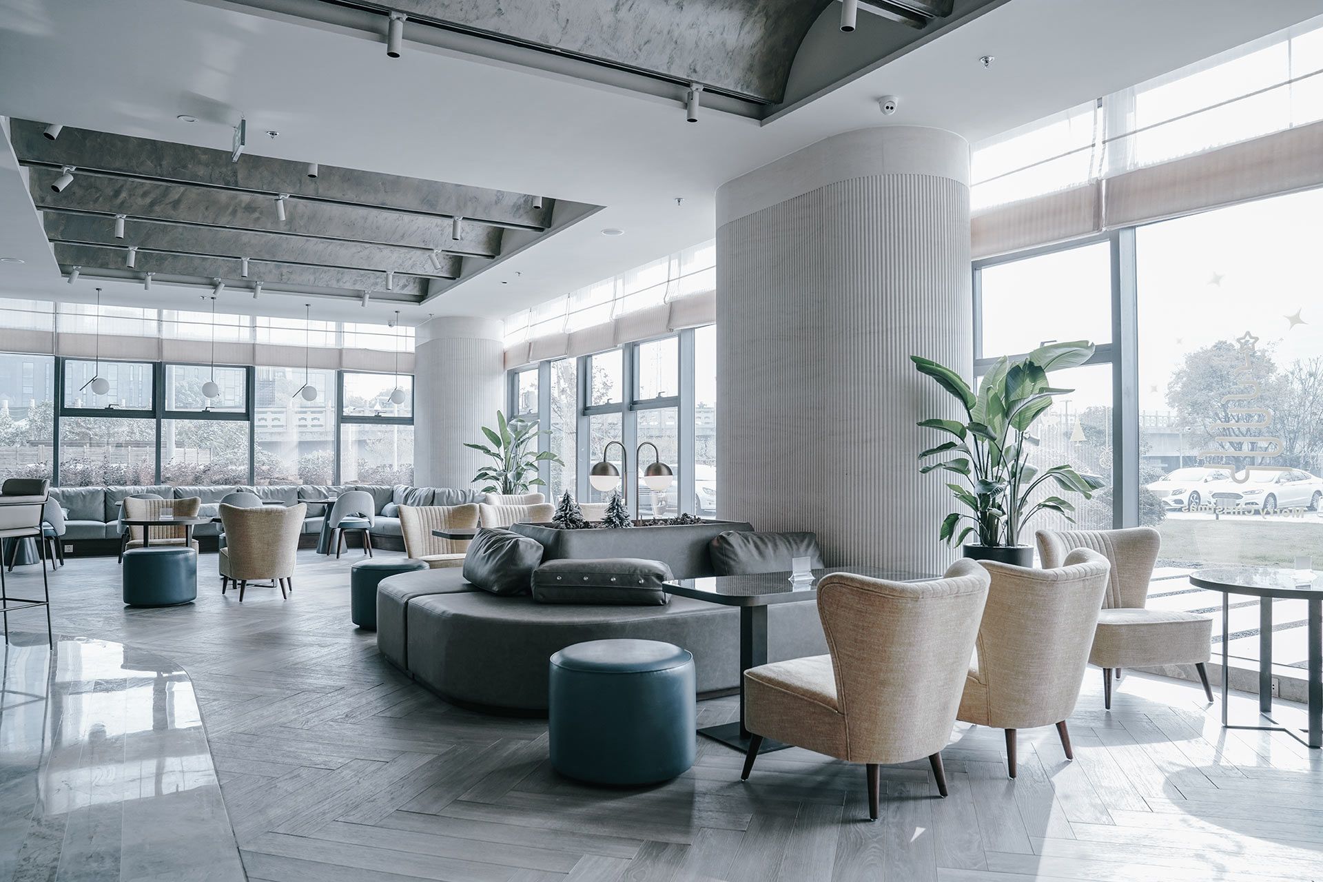 There are a lot of chairs and tables in this room.