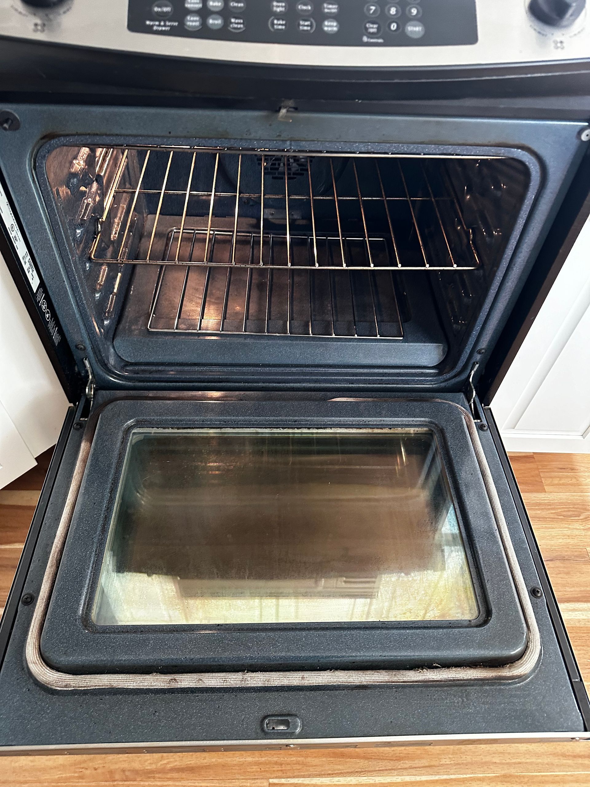 The inside of an oven with the door open