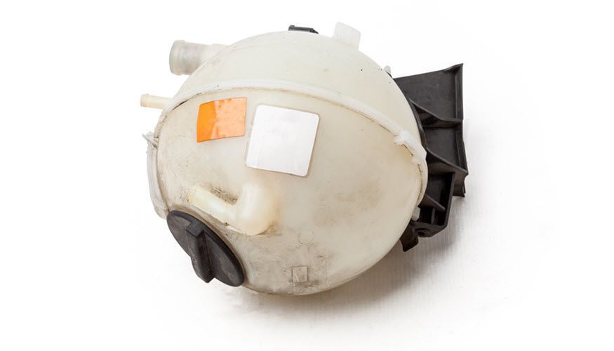 A close up of a plastic tank on a white background. | Import Specialty Service