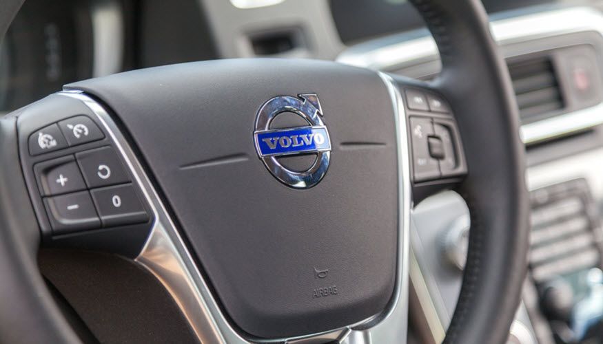A close up of the steering wheel of a volvo car | Import Specialty Service