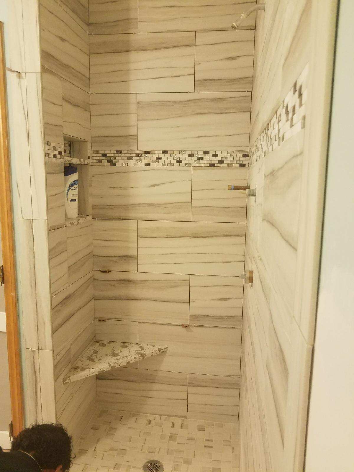 Custom shower tiling after bathroom design project in Fairfield, CT