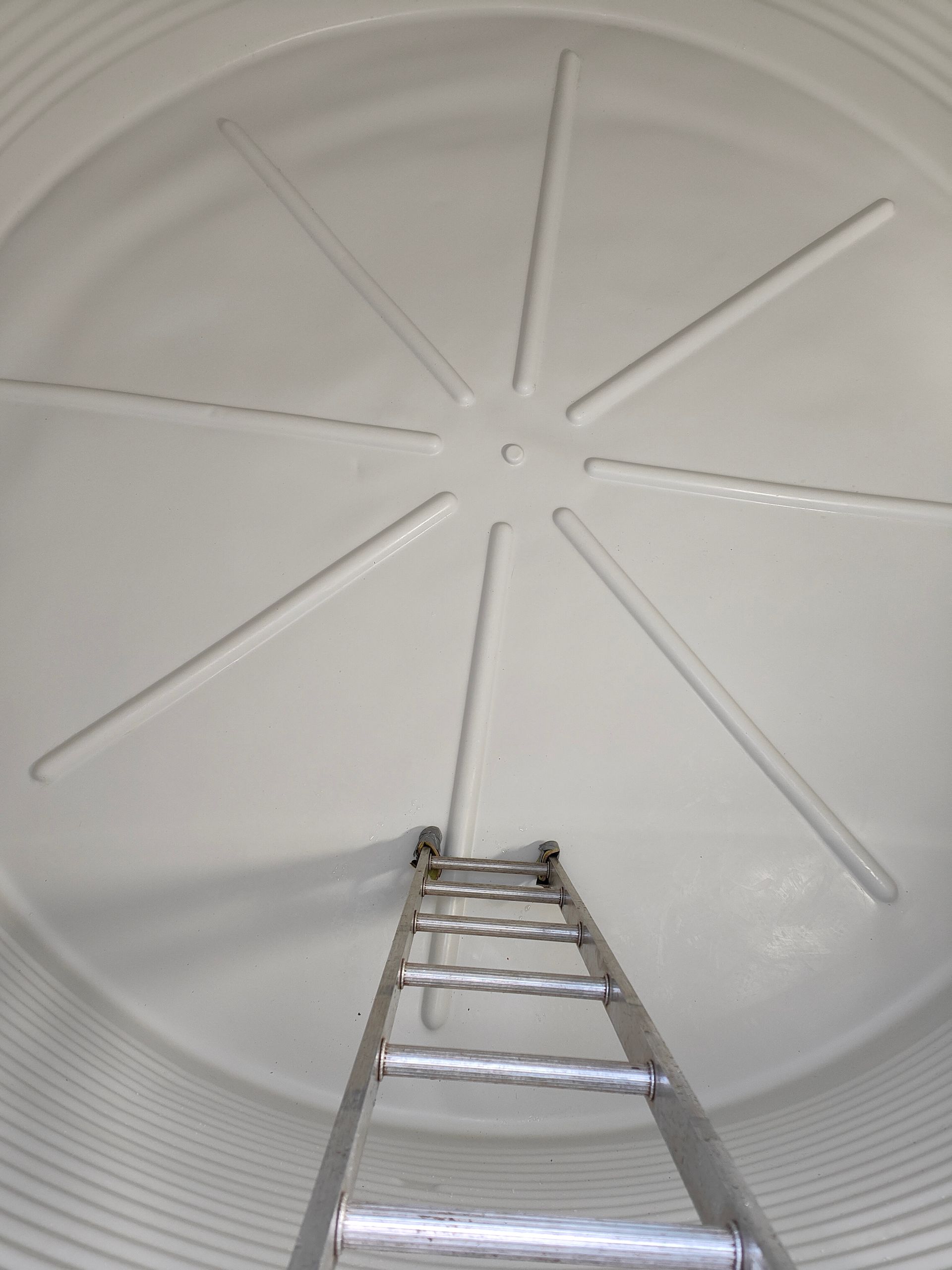 Large Metallic Water Tanks With Connected White Pipes — Hastings Water Care In Redbank, NSW