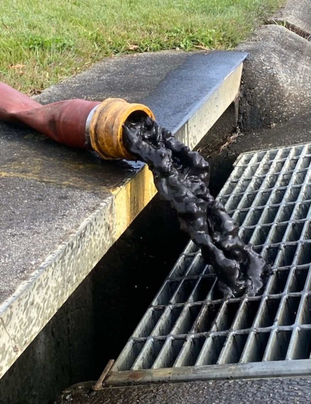 Dirty water being pumped into a drain - Hastings Water Care in Port Macquarie NSW