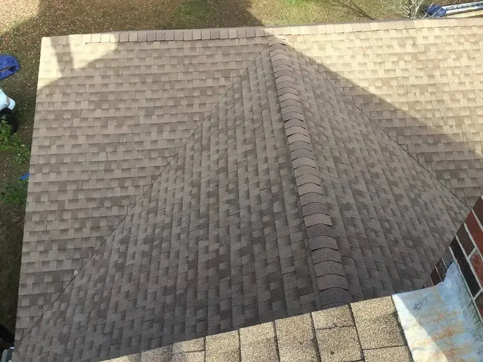 An aerial view of a roof with shingles on it.