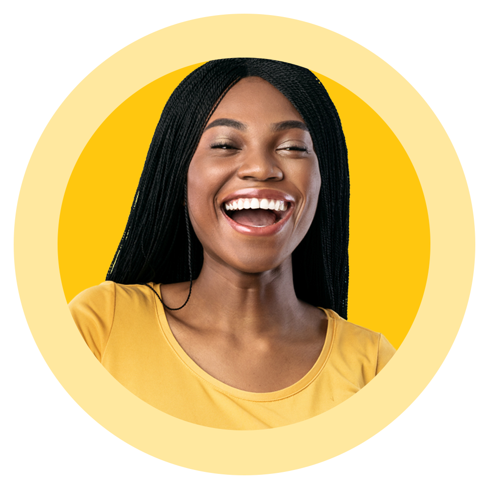 A woman in a yellow shirt is laughing in a yellow circle.