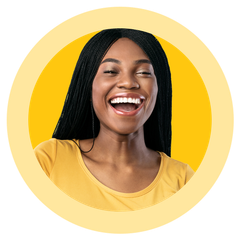 A woman in a yellow shirt is laughing in a yellow circle.