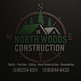 Logo for North Woods Construction with a compass, trees, and roof imagery, plus service list and phone numbers.