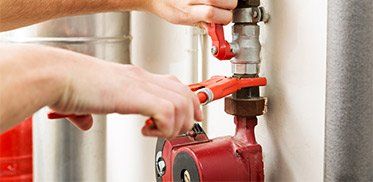 Plumber Working With Pipeline Connections - Plumber In Minden, NV