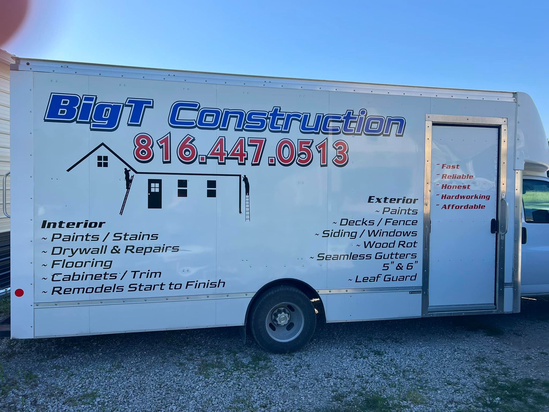 A white truck that says big t construction on the side. Door Hinge Repair How to Guide