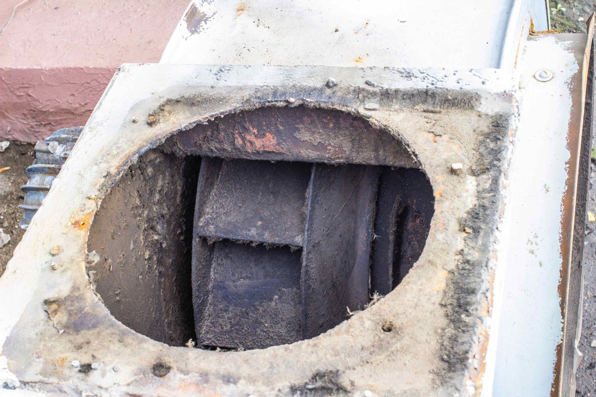 A very dusty air duct hole