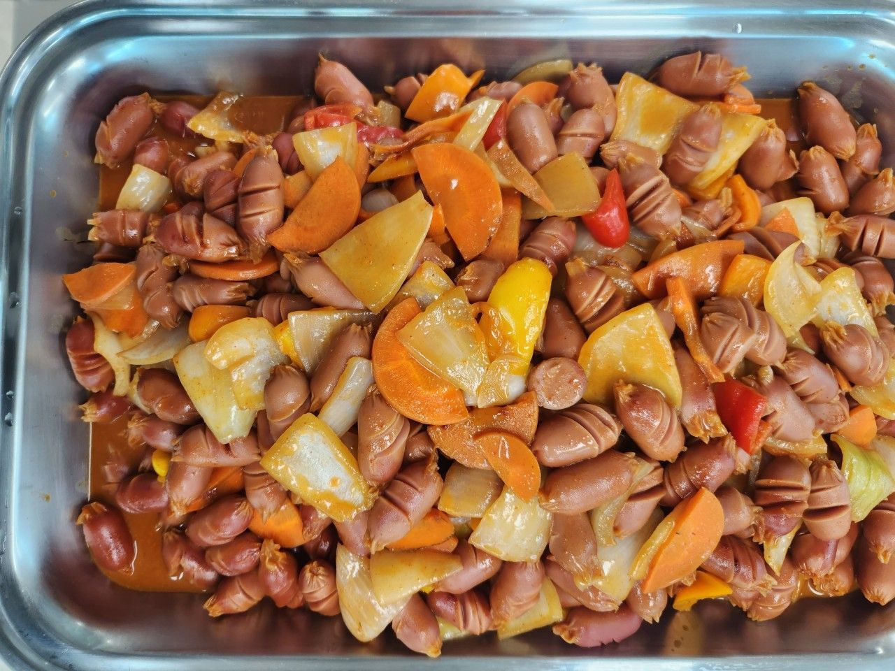 A rich variety of Korean food items presented at a buffet