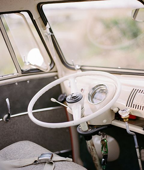 A close up of a steering wheel in a car