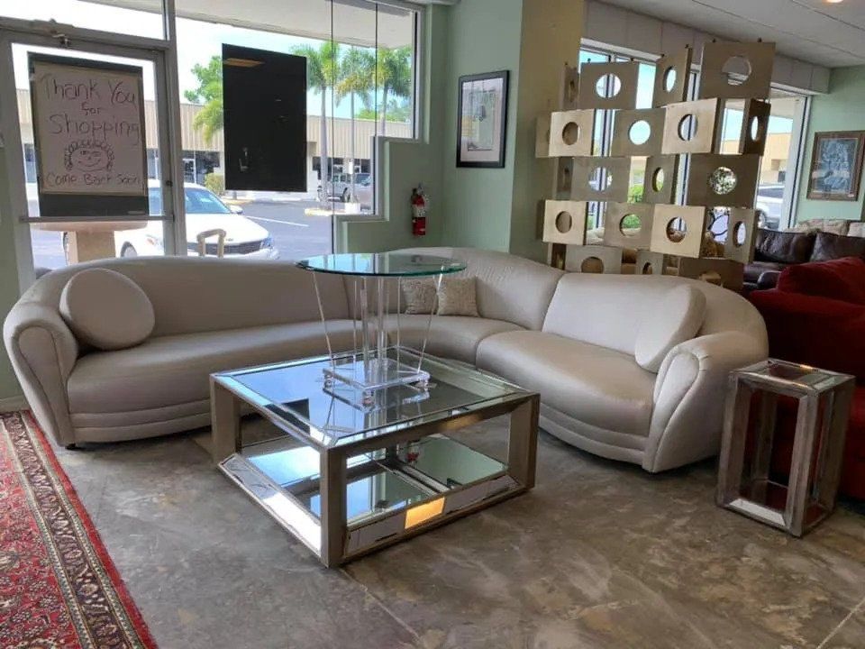 A living room with a couch and a coffee table